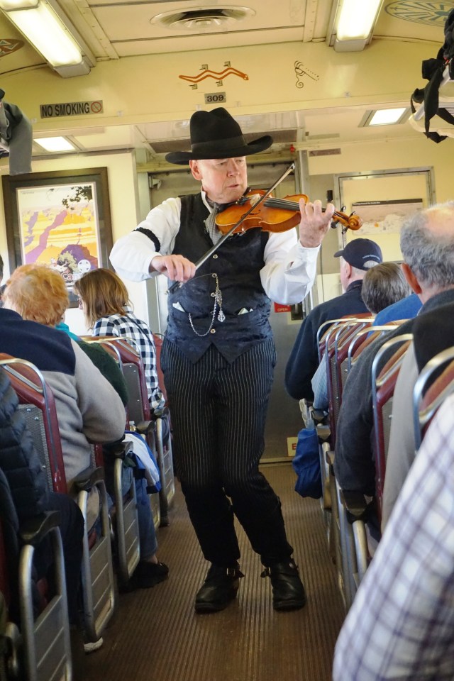 Fiddler-comic on the Grand Canyon Railway.JPG